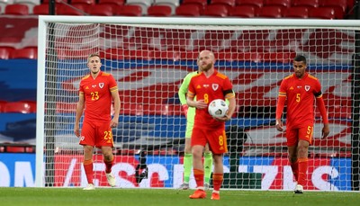 081020 - England v Wales - International Friendly -  Will Vaulks and Ben Cabango of Wales look dejected