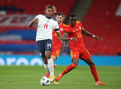 081020 - England v Wales - International Friendly -  Reece James of England and Rabbi Matondo of Wales compete