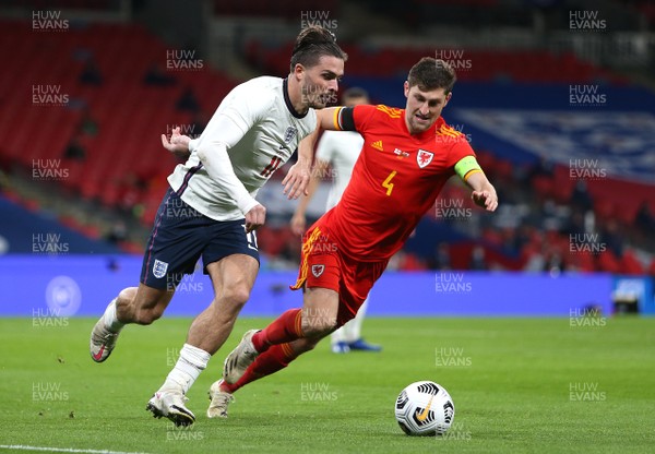081020 - England v Wales - International Friendly -  Jack Grealish of England tries to get past Ben Davies of Wales