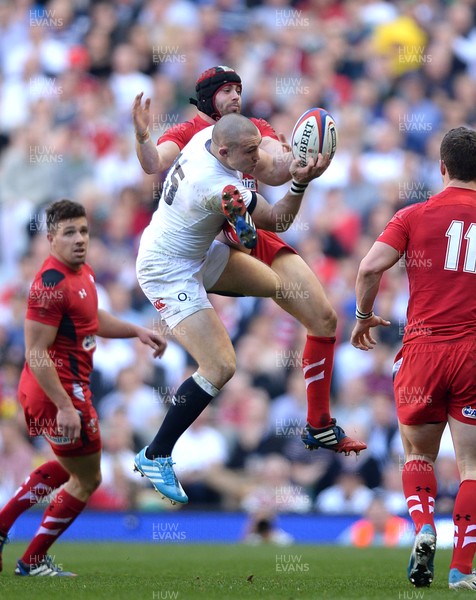 090314 - England v Wales - RBS 6 Nations 2014 -Leigh Halfpenny of Wales and Mike Brown of England compete for high ball