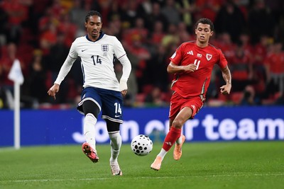 091025 - England v Wales - International Friendly - Djed Spence of England is challenged by Brennan Johnson of Wales