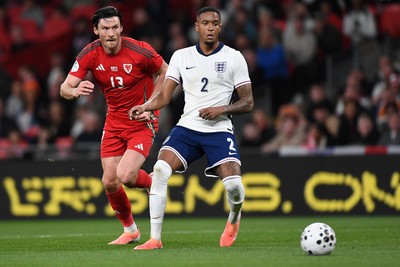 091025 - England v Wales - International Friendly - Ezri Konsa of England is challenged by Kieffer Moore of Wales