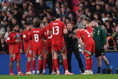 091025 - England v Wales - International Friendly - Craig Bellamy, Wales Manager speaks to his team