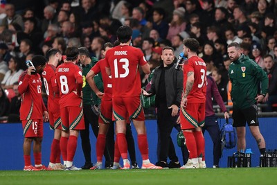 091025 - England v Wales - International Friendly - Craig Bellamy, Wales Manager speaks to his team