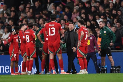 091025 - England v Wales - International Friendly - Craig Bellamy, Wales Manager speaks to his team