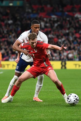 091025 - England v Wales - International Friendly - David Brooks of Wales is challenged by Ezri Konsa of England