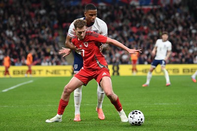 091025 - England v Wales - International Friendly - David Brooks of Wales is challenged by Ezri Konsa of England