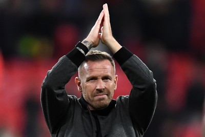 091025 - England v Wales - International Friendly - Craig Bellamy, Wales Manager applauding the travelling fans at full time