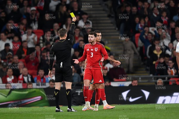 091025 - England v Wales - International Friendly - Neco Williams of Wales receives a yellow card