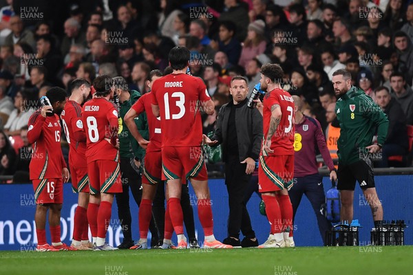 091025 - England v Wales - International Friendly - Craig Bellamy, Wales Manager speaks to his team