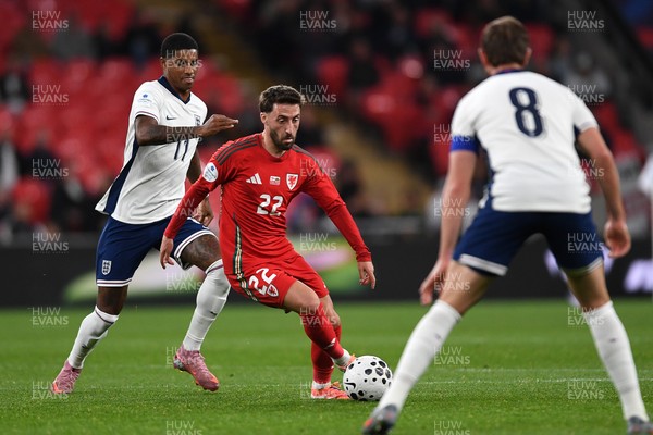 091025 - England v Wales - International Friendly - Josh Sheehan of Wales is challenged by Marcus Rashford of England