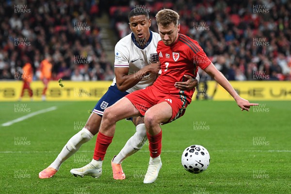 091025 - England v Wales - International Friendly - David Brooks of Wales is challenged by Ezri Konsa of England