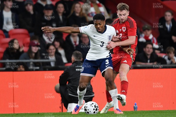 091025 - England v Wales - International Friendly - David Brooks of Wales is challenged by Myles Lewis-Skelly of England