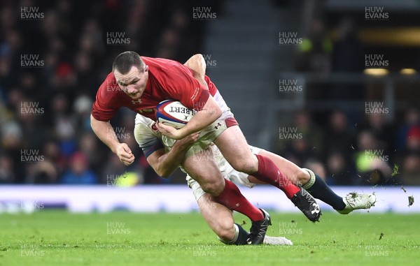 100218 - England v Wales - NatWest 6 Nations - Ken Owens of Wales is tackled by George Ford of England