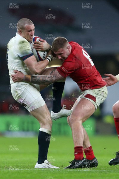 100218 - England v Wales - Natwest 6 Nations - Mike Brown of England is tackled by Ross Moriarty of Wales
