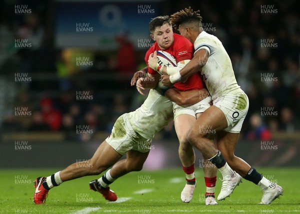 100218 - England v Wales - Natwest 6 Nations - Steff Evans of Wales is tackled by Jonathan Joseph and Anthony Watson of England