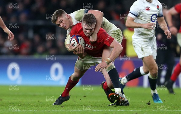 100218 - England v Wales - Natwest 6 Nations - Gareth Anscombe of Wales is tackled by Owen Farrell of England