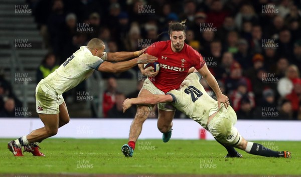 100218 - England v Wales - Natwest 6 Nations - Josh Navidi of Wales is tackled by Sam Underhill of England