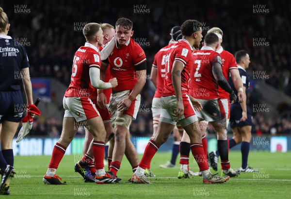 100224 - England v Wales - Guinness 6 Nations - Alex Mann of Wales is jumped on by team mates celebrating his try