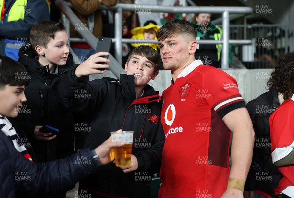 100224 - England v Wales - Guinness 6 Nations - Alex Mann of Wales with fans at full time