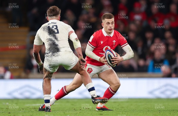 100224 - England v Wales, Guinness 6 Nations 2024 - Cameron Winnett of Wales takes on Henry Slade of England