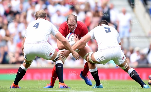 110819 - England v Wales - Quilter International - Alun Wyn Jones of Wales is tackled by Joe Launchbury and Charlie Ewels of England