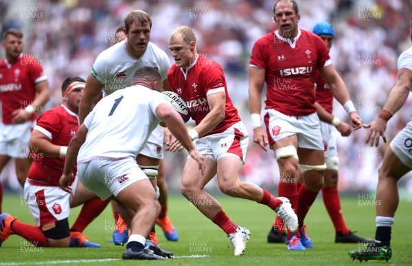 110819 - England v Wales - Quilter International - Aled Davies of Wales is tackled by Ellis Genge of England