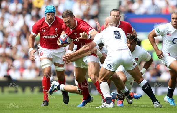 110819 - England v Wales - World Cup Warm Up - Quilter International - George North of Wales is tackled by Lewis Ludlam of England
