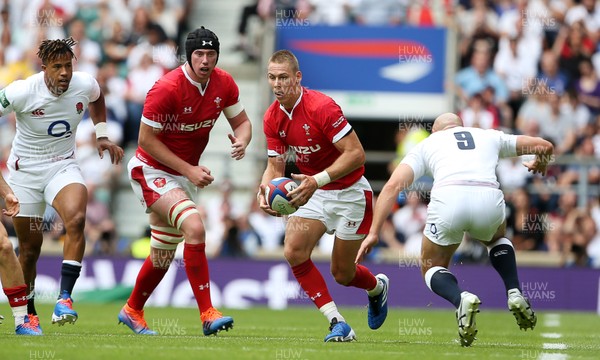 110819 - England v Wales - World Cup Warm Up - Quilter International - Liam Williams of Wales is challenged by Willi Heinz of England
