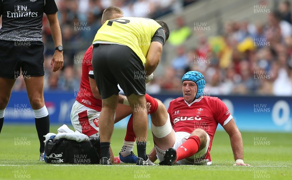 110819 - England v Wales - World Cup Warm Up - Quilter International - Justin Tipuric of Wales is seen to by medics