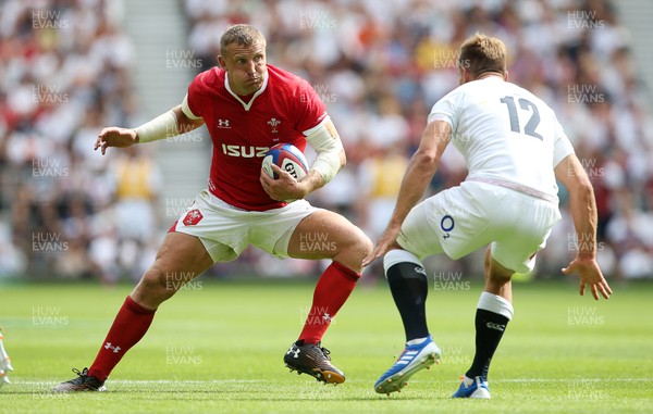 110819 - England v Wales - World Cup Warm Up - Quilter International - Hadleigh Parkes of Wales is tackled by Piers Francis of England
