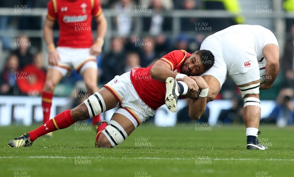 120316 - England v Wales - RBS 6 Nations - Taulupe Faletau of Wales tackles Billy Vunipola of England