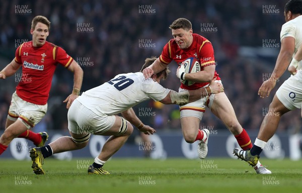 120316 - England v Wales - RBS 6 Nations - Rhys Priestland of Wales is tackled by Jack Clifford of England