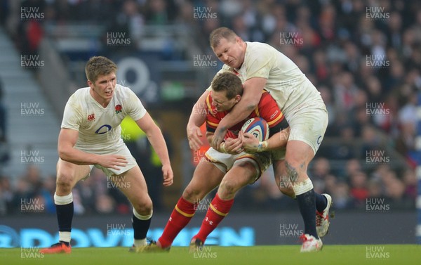 120316 - England v Wales - RBS 6 Nations 2016 -Dan Biggar of Wales is tackled by Dylan Hartley of England