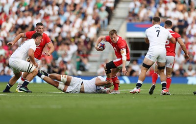 120823 - England v Wales - Summer Nations Series - Nick Tompkins of Wales is tackled by George Martin of England 