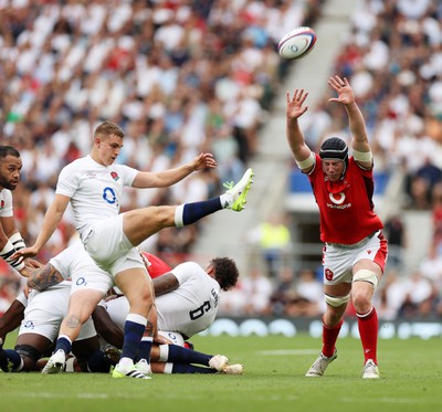 120823 - England v Wales - Summer Nations Series - Adam Beard of Wales charges down the kick of Jack van Poortvliet of England 