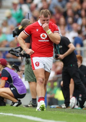 120823 - England v Wales - Summer Nations Series - Dewi Lake of Wales leaves the field injured