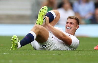 120823 - England v Wales - Summer Nations Series - Jack van Poortvliet of England goes down injured