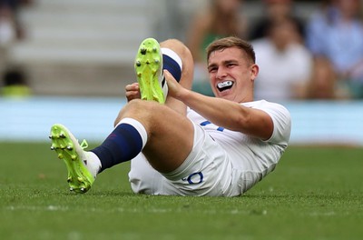 120823 - England v Wales - Summer Nations Series - Jack van Poortvliet of England goes down injured