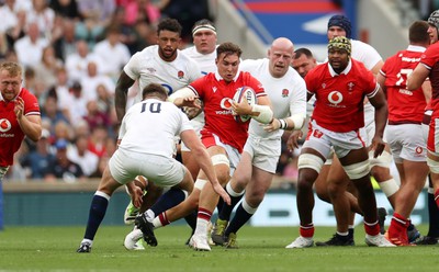 120823 - England v Wales - Summer Nations Series - Taine Basham of Wales is challenged by Owen Farrell of England 