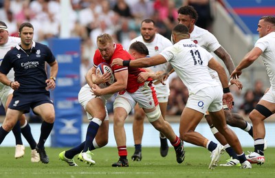 120823 - England v Wales - Summer Nations Series - Tommy Reffell of Wales is tackled by Ben Youngs of England 