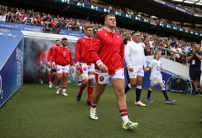 120823 - England v Wales - Summer Nations Series - Dewi Lake of Wales walks out the tunnel along side Owen Farrell of England 