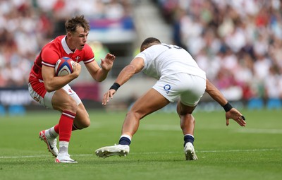 120823 - England v Wales, Summer Nations Series 2023 - Tom Rogers of Wales takes on Joe Marchant of England