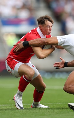 120823 - England v Wales, Summer Nations Series 2023 - Tom Rogers of Wales takes on Joe Marchant of England