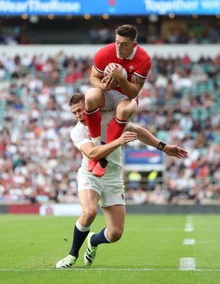 120823 - England v Wales, Summer Nations Series 2023 - Josh Adams of Wales is tackled in the air by Freddie Steward of England, resulting in a penalty try