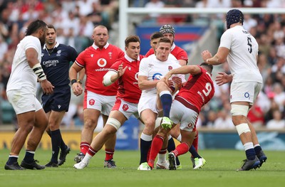 120823 - England v Wales, Summer Nations Series 2023 - Freddie Steward of England and Tomos Williams of Wales compete for the ball