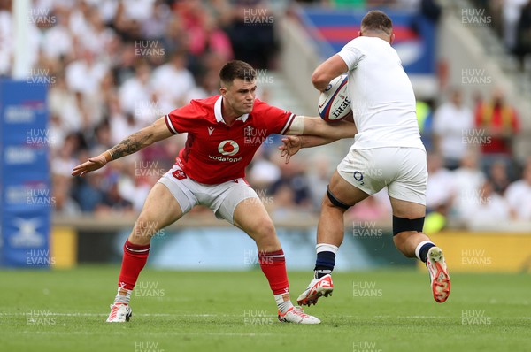 120823 - England v Wales - Summer Nations Series - Joe Roberts of Wales makes a tackle