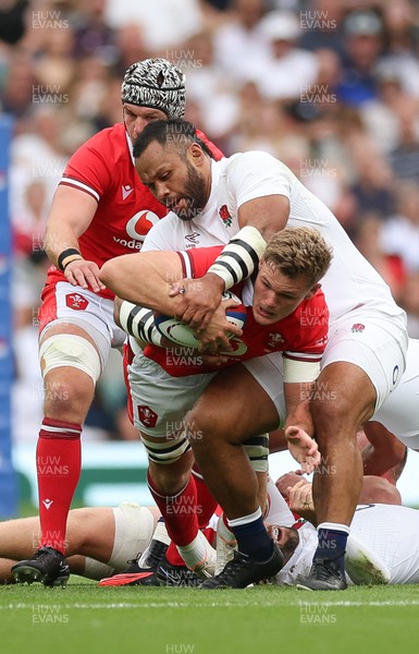 120823 - England v Wales, Summer Nations Series 2023 - Taine Plumtree of Wales is tackled by Billy Vunipola of England