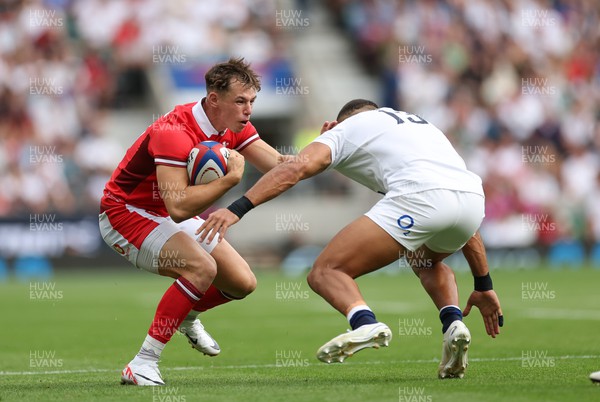 120823 - England v Wales, Summer Nations Series 2023 - Tom Rogers of Wales takes on Joe Marchant of England