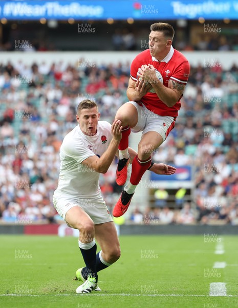 120823 - England v Wales, Summer Nations Series 2023 - Josh Adams of Wales is tackled in the air by Freddie Steward of England, resulting in a penalty try